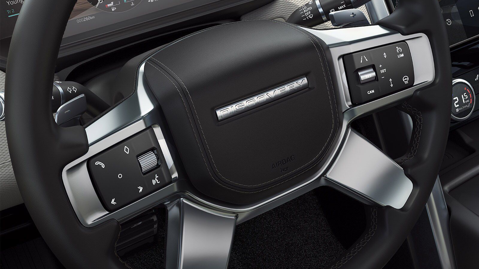 Доступ к функциям осуществляется с помощью незаметных до активации переключателей на рулевом колесе.